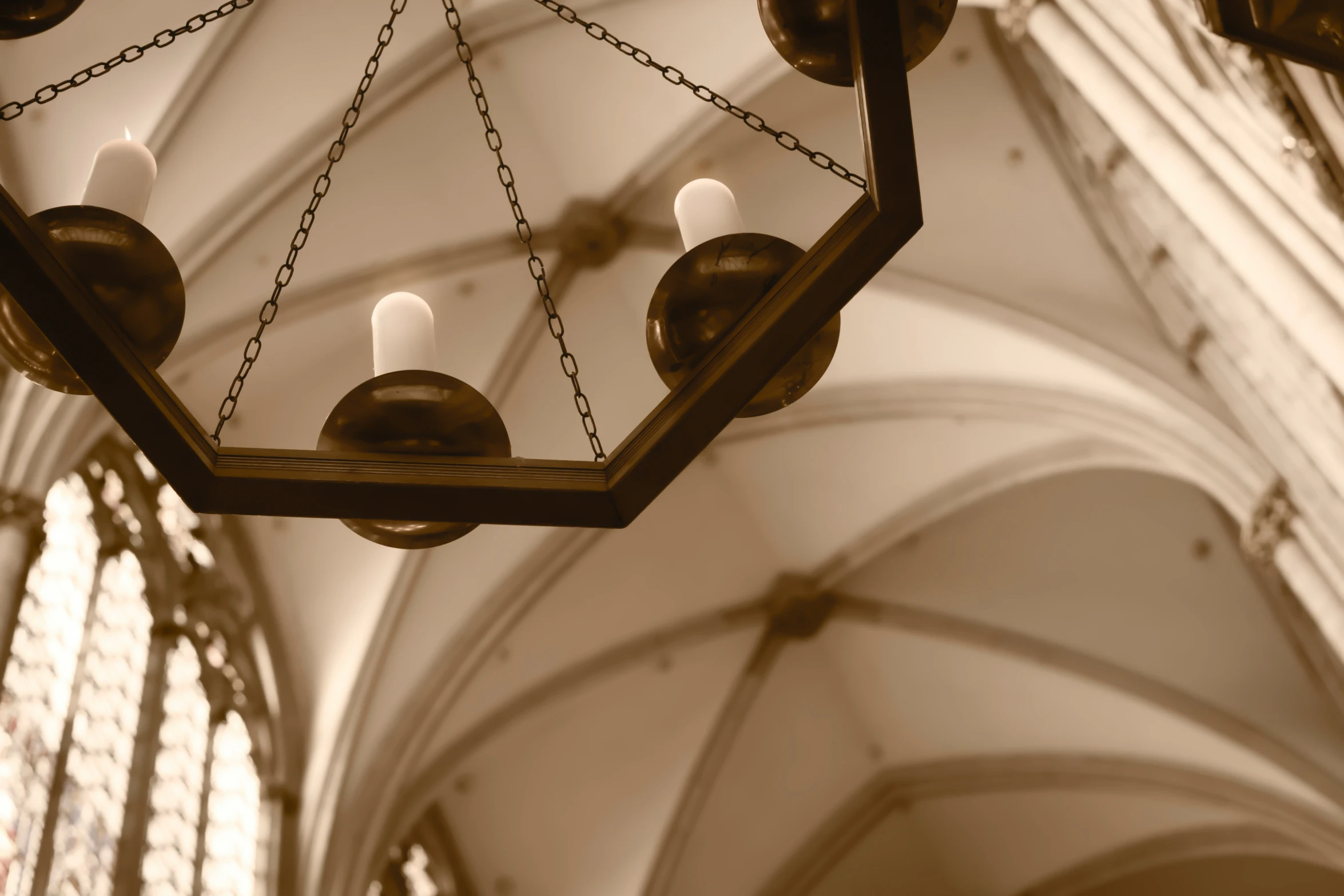 the chandelier of the inside of a cathedral