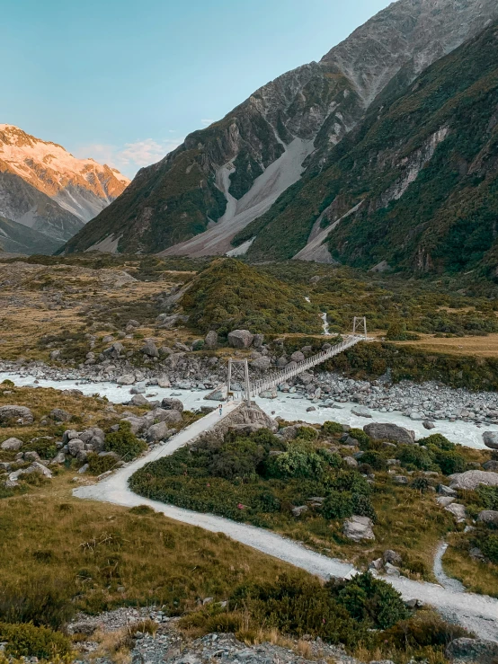 an aerial view of the landscape in the mountains