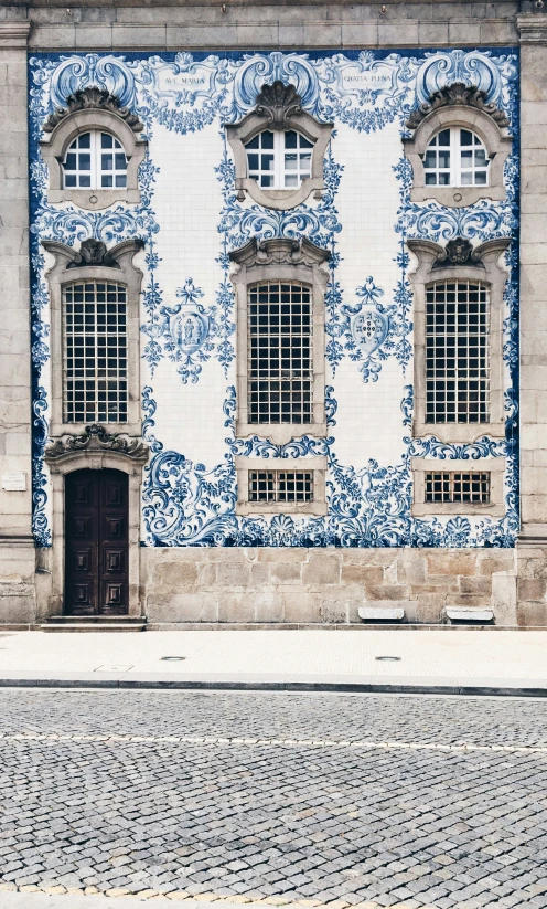 blue and white decorative buildings have four large windows