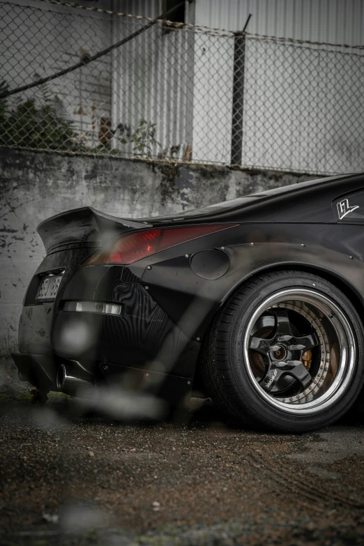 an old fashioned race car with rust on the tires