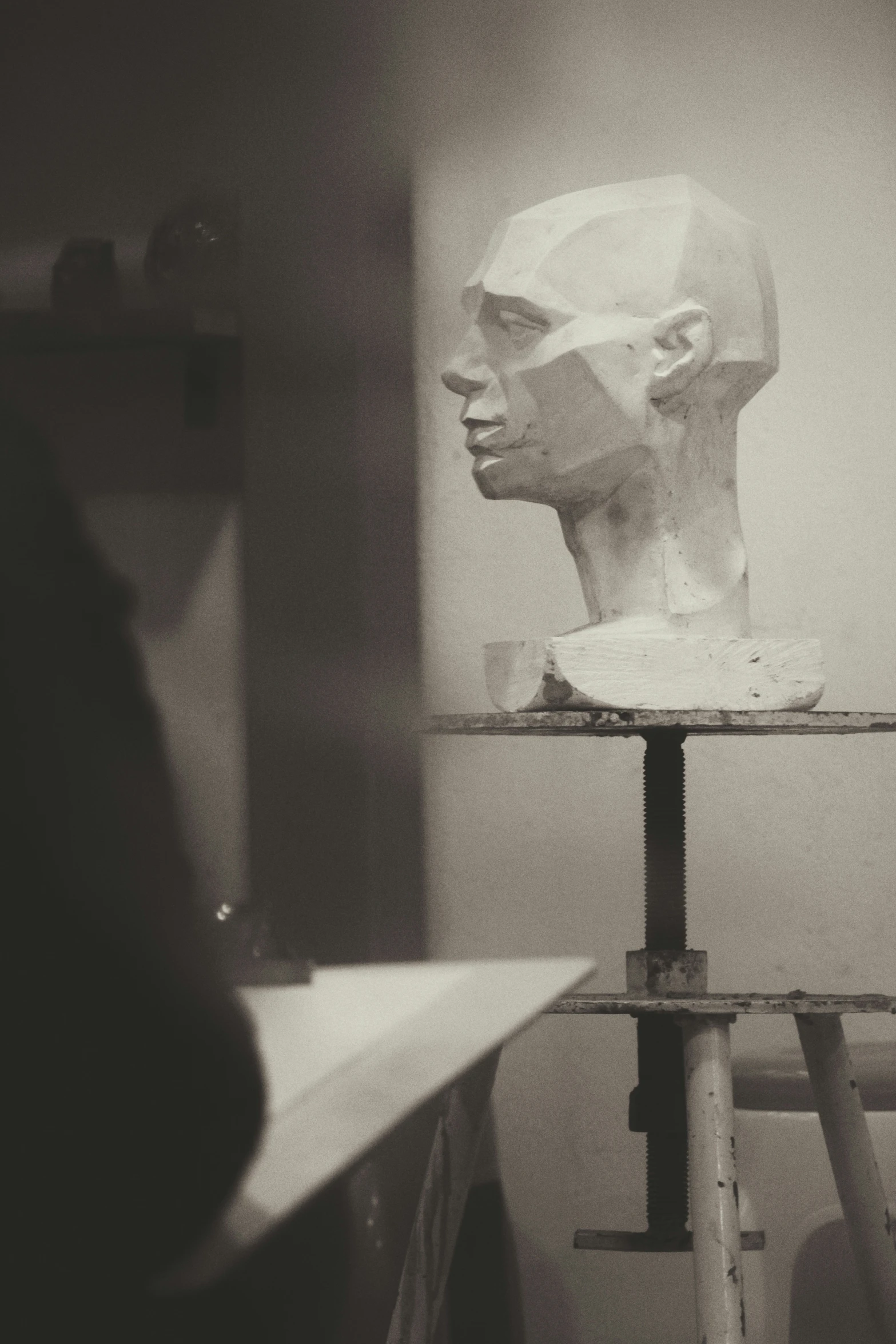 the statue of a man is in progress