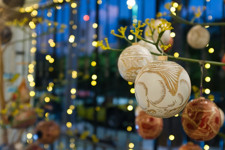 an arrangement of ornaments hanging from a wire