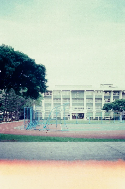 an old playground has swings and other things on it