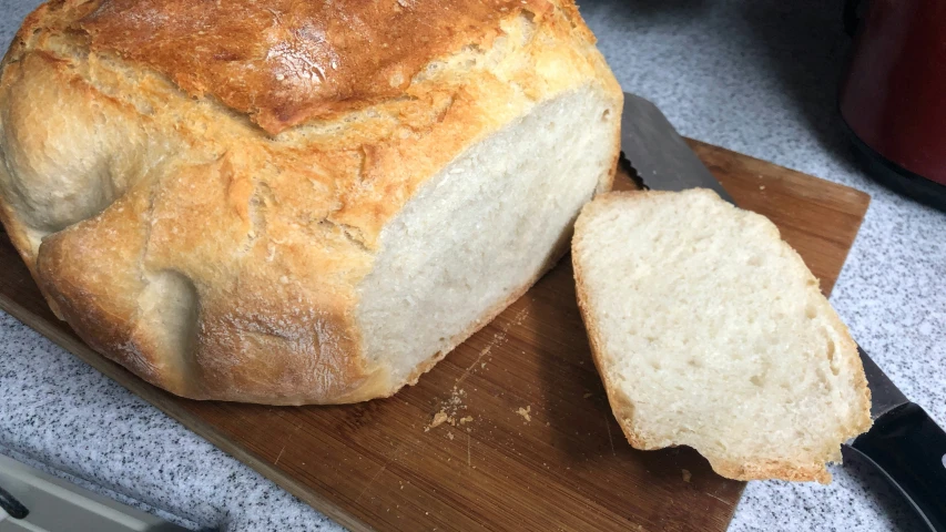 a large loaf of bread on top of a  board