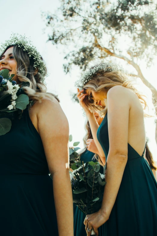 the bridesmaid's make up their wedding dress for the ceremony