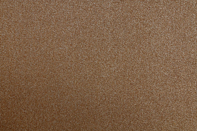 a light brown colored, ultra thin area rug