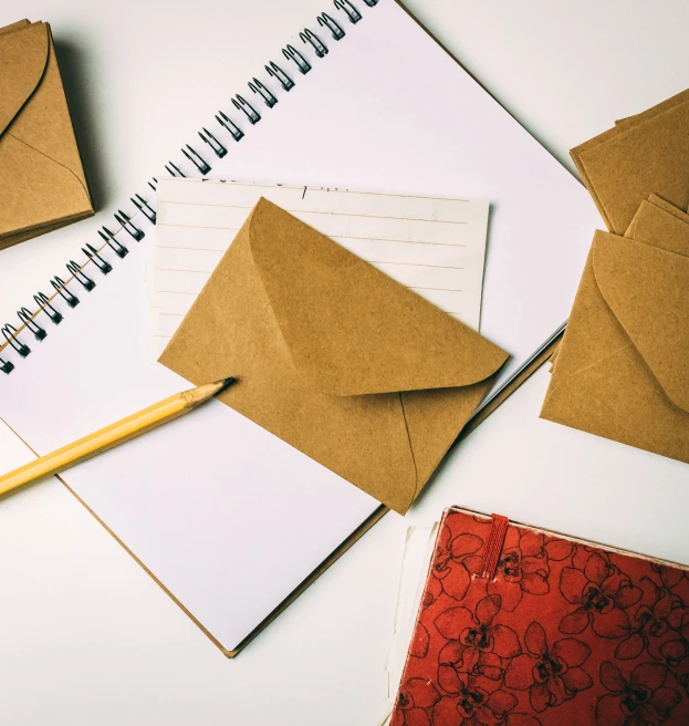 paper notebooks and other paper goods are arranged together