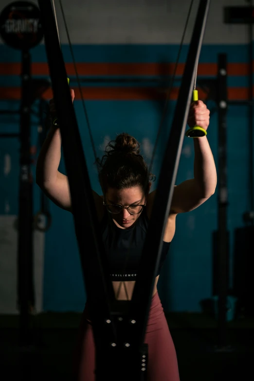 a woman doing crossfit at the gym