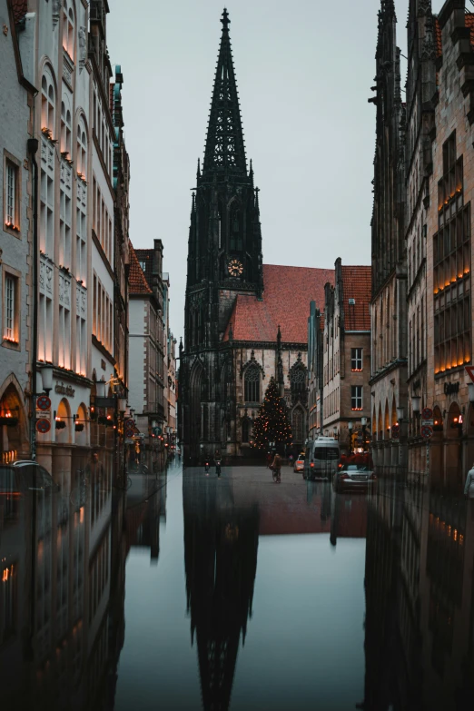 a river is lined with large buildings next to some water