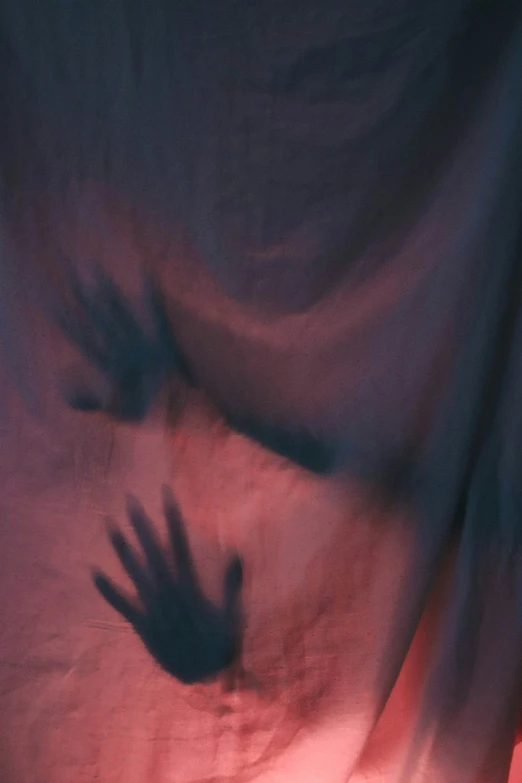 an image of blurry hands in the air