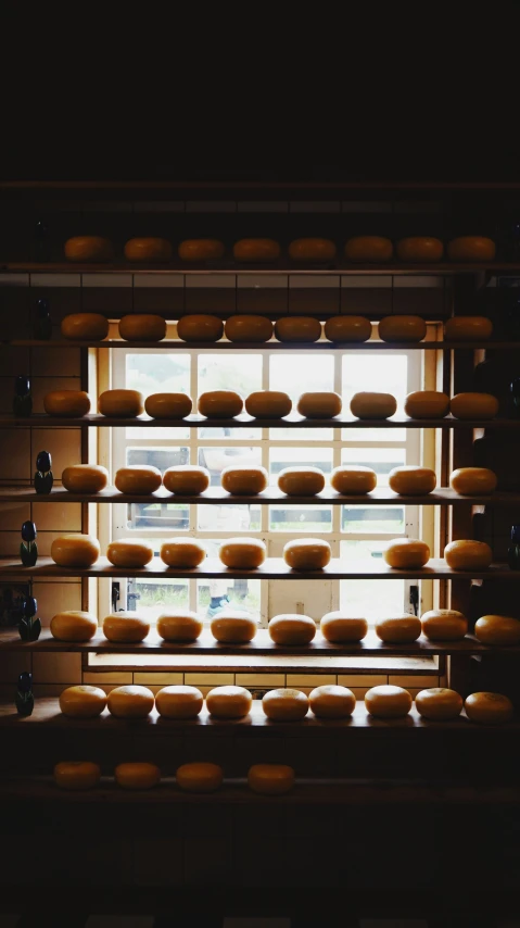 an empty room with a large number of lights and some plates of food