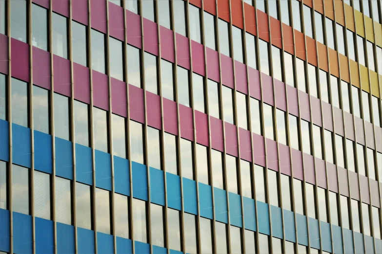 colored bricks, windows and bars on the wall