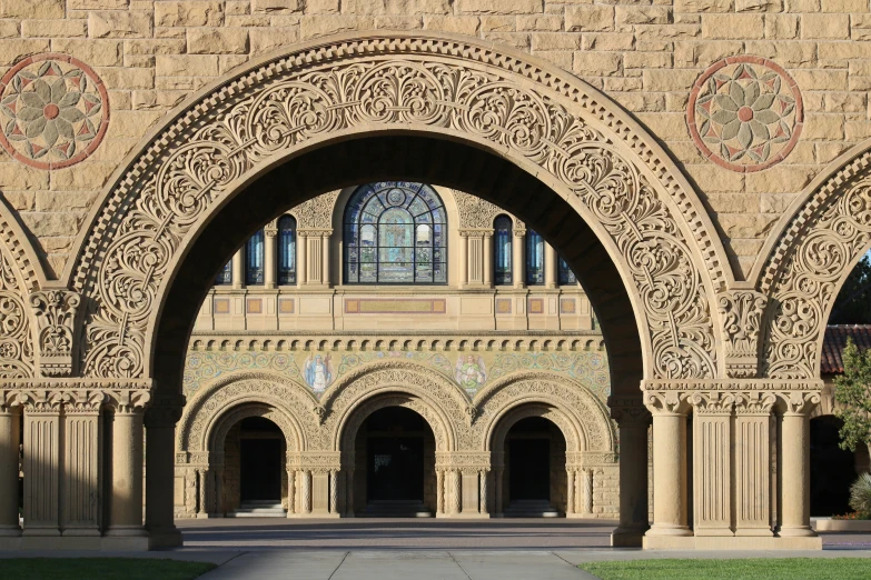 a large brick building with a large doorway and arch