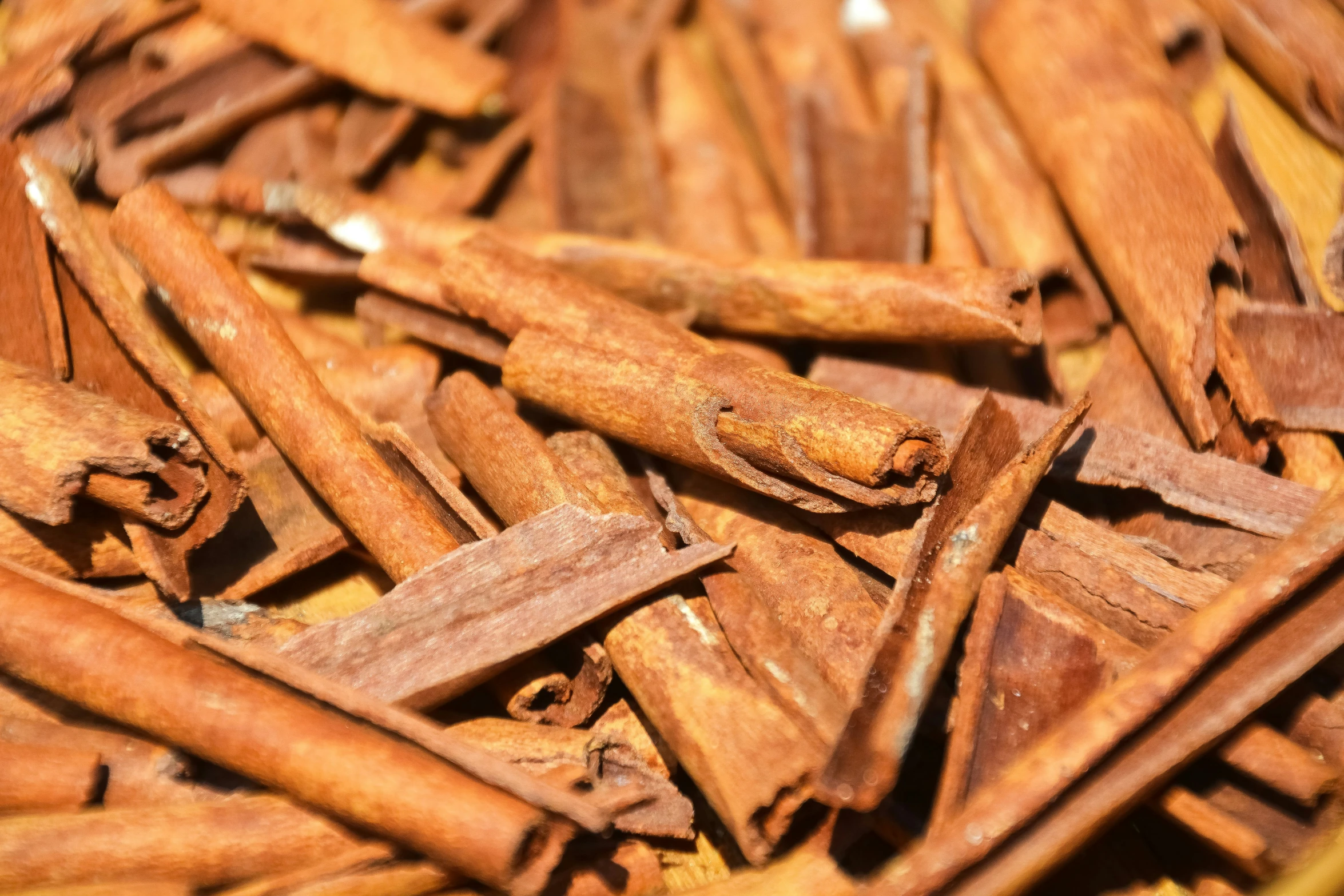 an image of a pile of cinnamon sticks