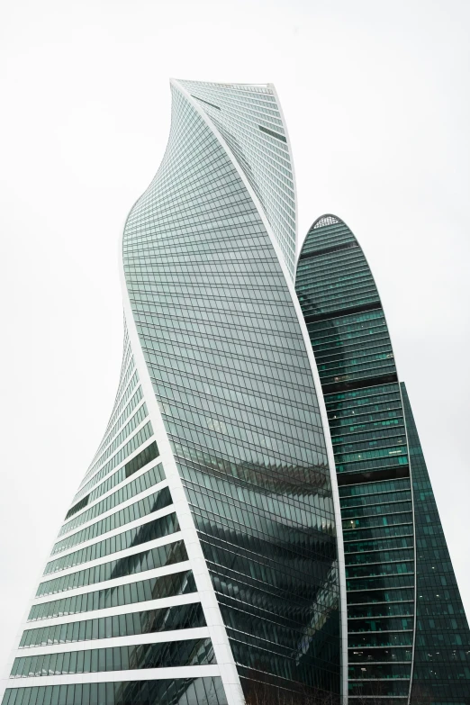 a tall building is made of triangular buildings