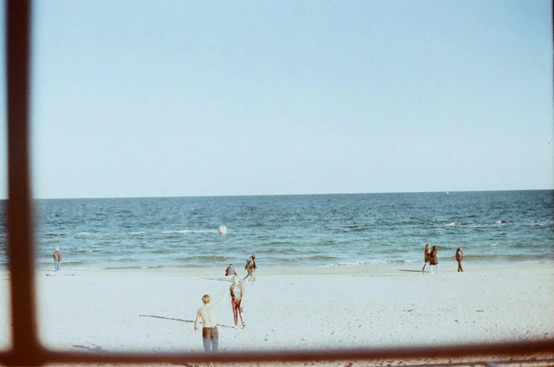 a few people that are on the beach