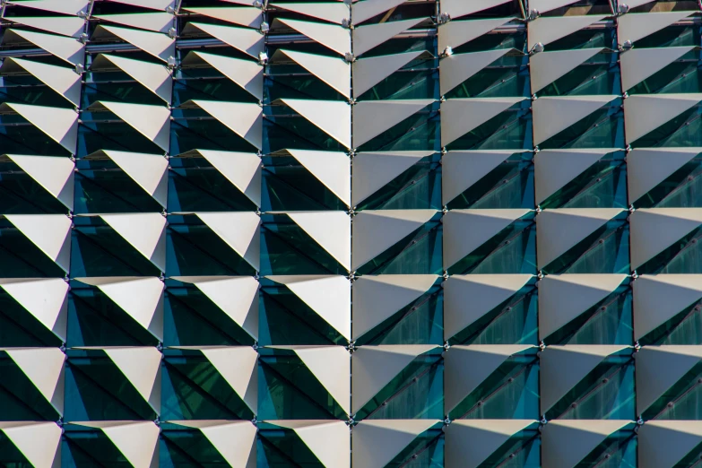 a view from above of a shiny, silver and blue building