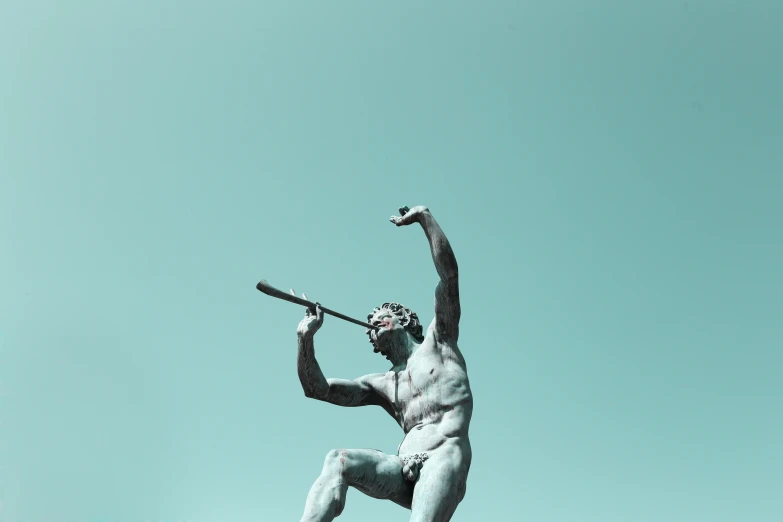 a statue with a baseball bat and two hands