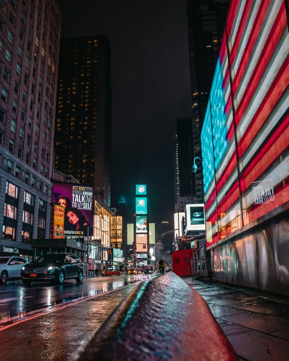 a long s of the city street during a rain shower