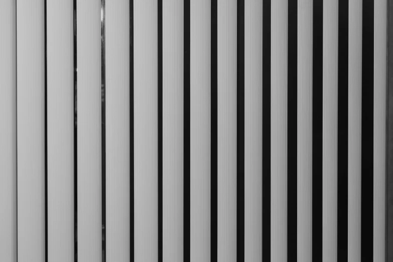 a white and black po of lines on a wall