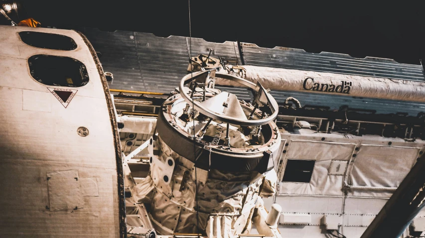 looking down on a space station attached to an airplane