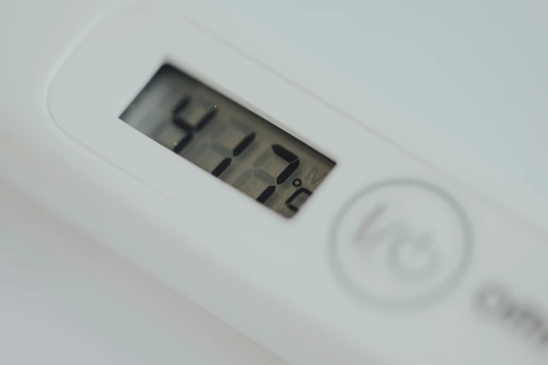 a close - up of a digital thermometer showing five forty nine minutes