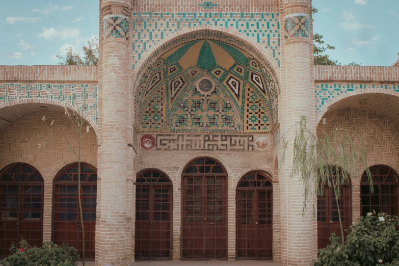 an elaborate building has multiple arches and doors