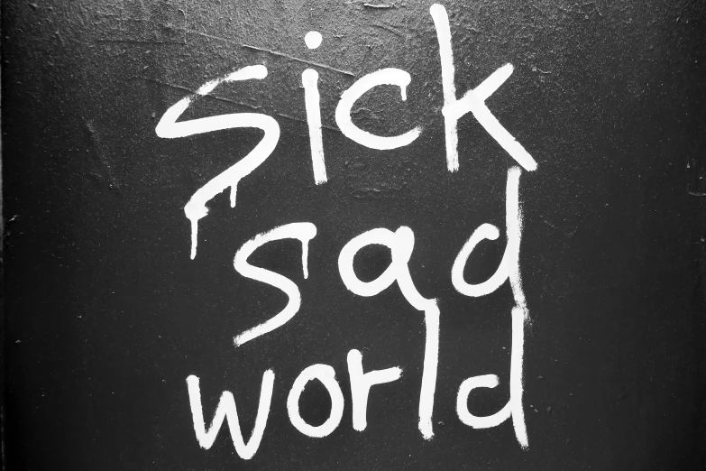 there is a black and white sign that says sick sad world