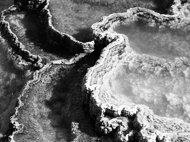 aerial s of ice and snow, with water around it