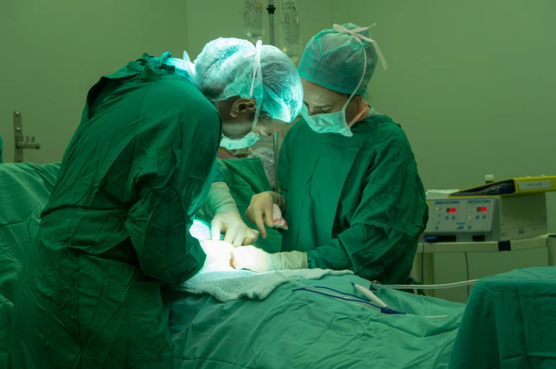 medical workers performing  in a large room