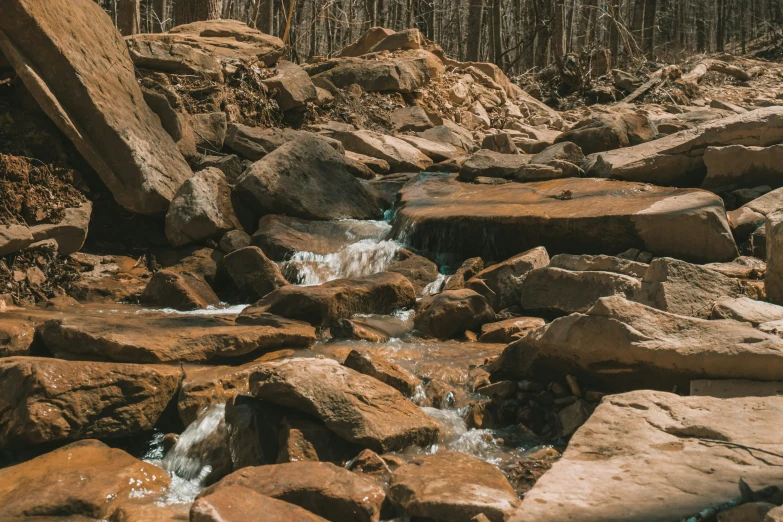 this is a beautiful creek by some rocks