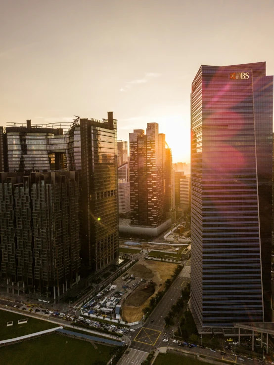 an aerial view of some very large city buildings