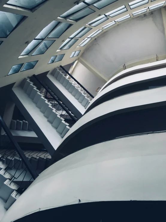 an art deco building with an atrium and skylights