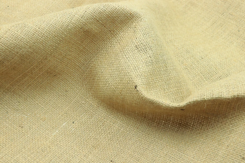 beige plain fabric or upholster fabric with small circles of color