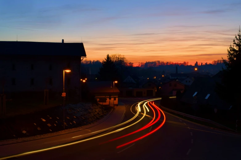 a street with traffic lights during the night