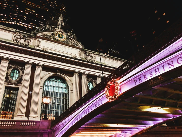 a train station at night in the city