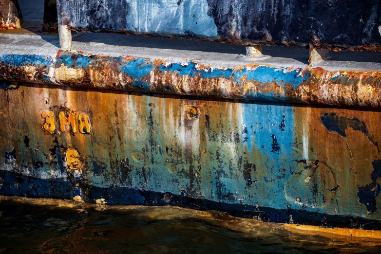 water in the background and rust on the side