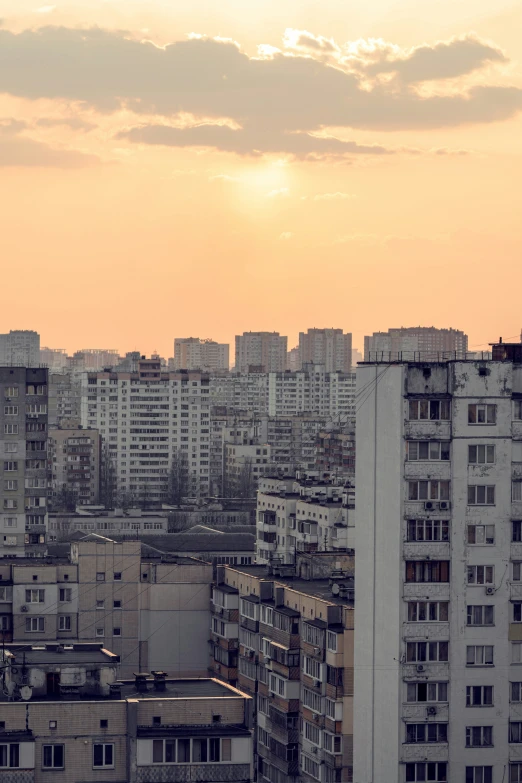 a couple of tall buildings sitting next to each other