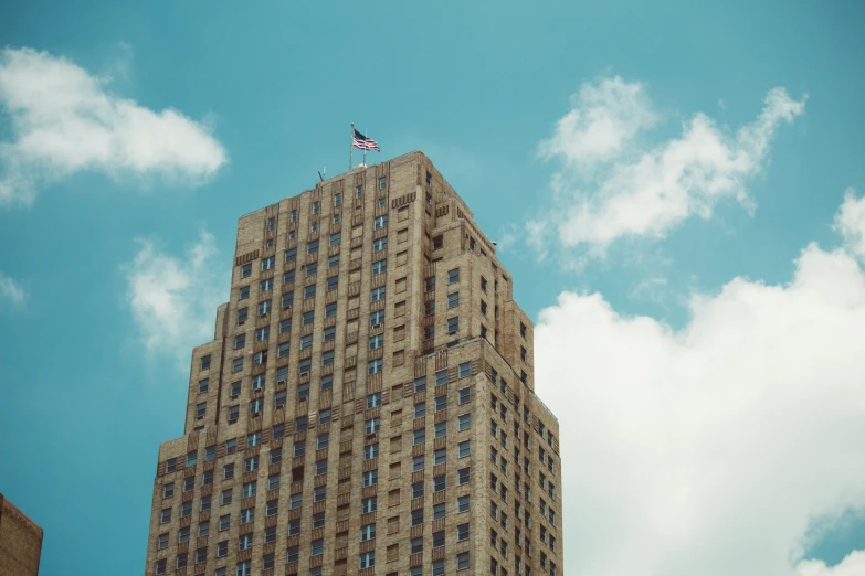 the top of a building that is on the corner of the street