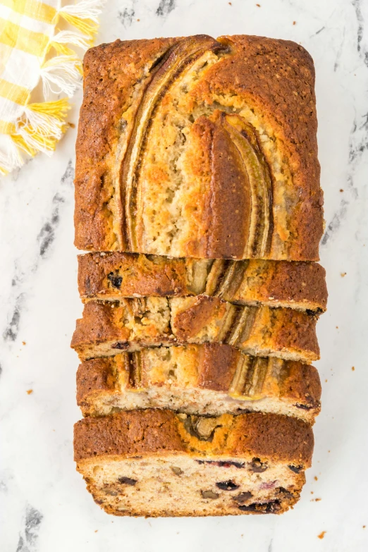 several sliced loafs of bread sitting on top of each other