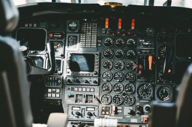 the inside of a large cockpit with many dials