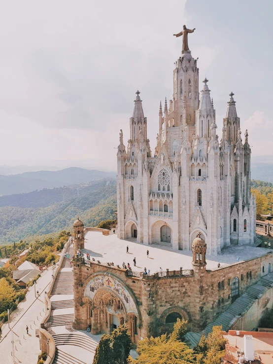 the large cathedral on top of a mountain