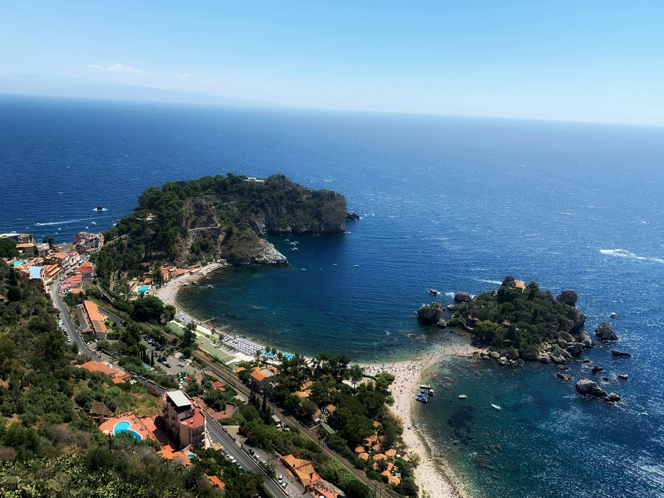 the view over a beach from a cliff