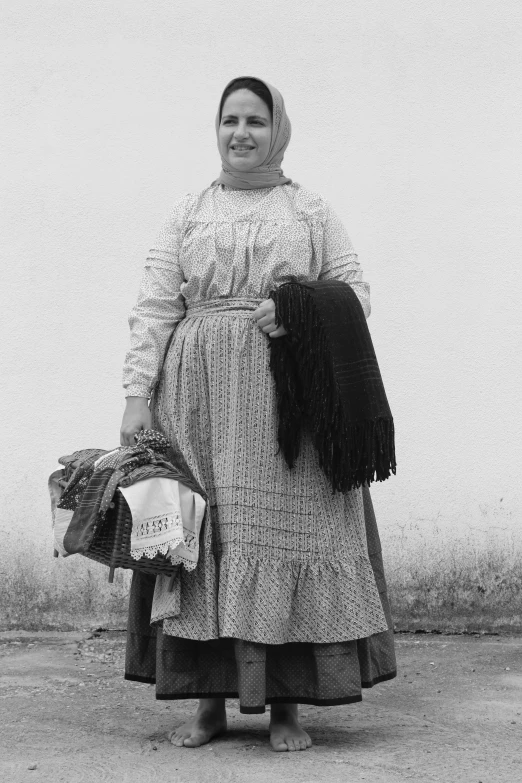 woman holding bags and smiling on a city street