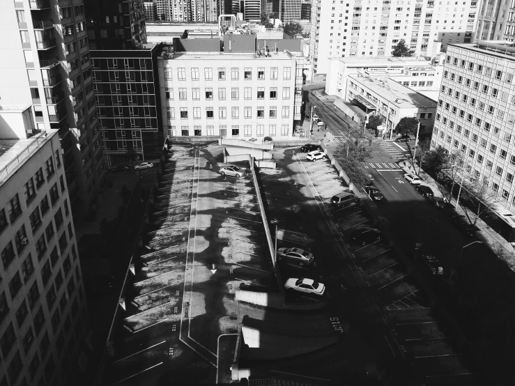 buildings stand in the foreground in black and white