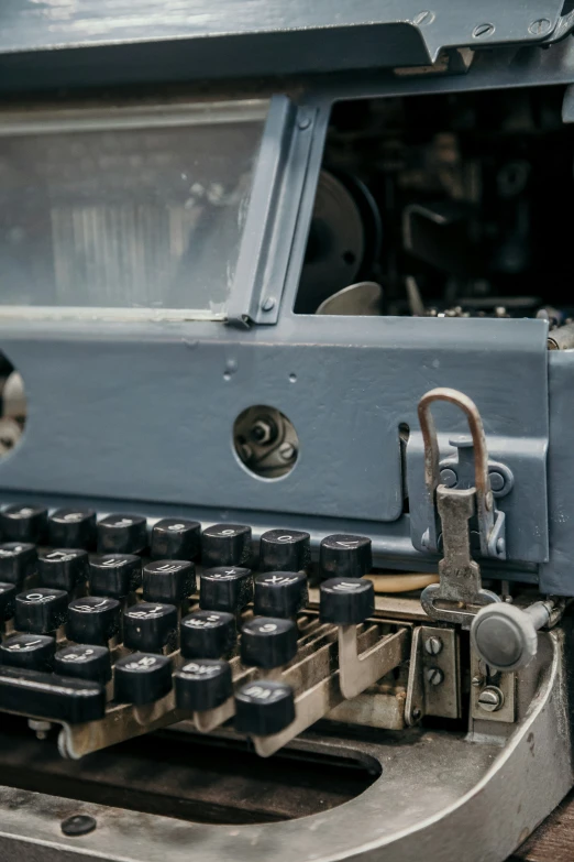 a close up of an old style typewriter