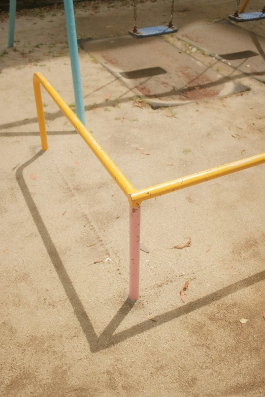 yellow bars are used to play on the playground