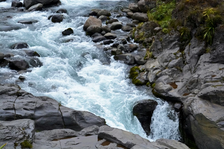 a small river flowing among some rocks