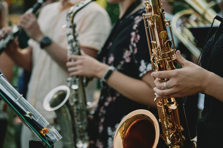 some people with musical instruments and their hands