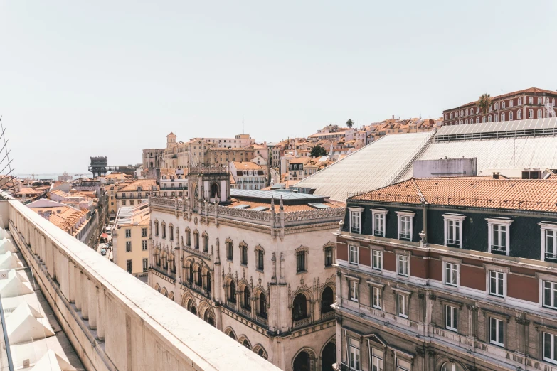 looking down at rooftops and buildings of urban area